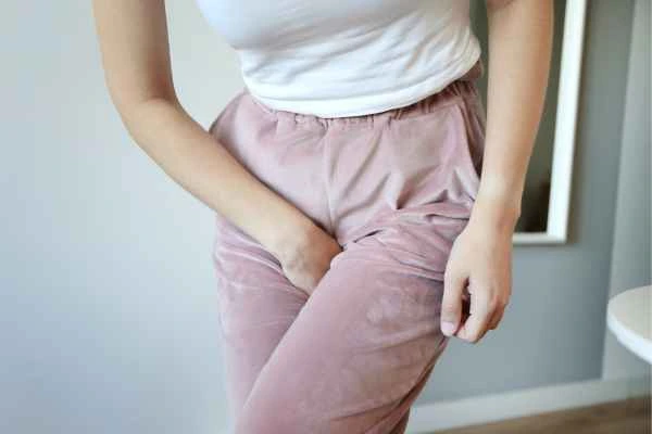 woman struggling with urine incontinence Little Bognor